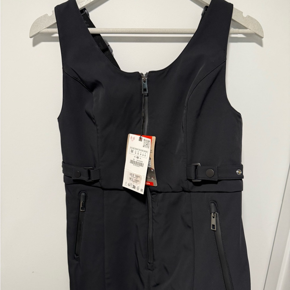 Zara Black Jumpsuit with Deep V-Neckline and Structured Fabric